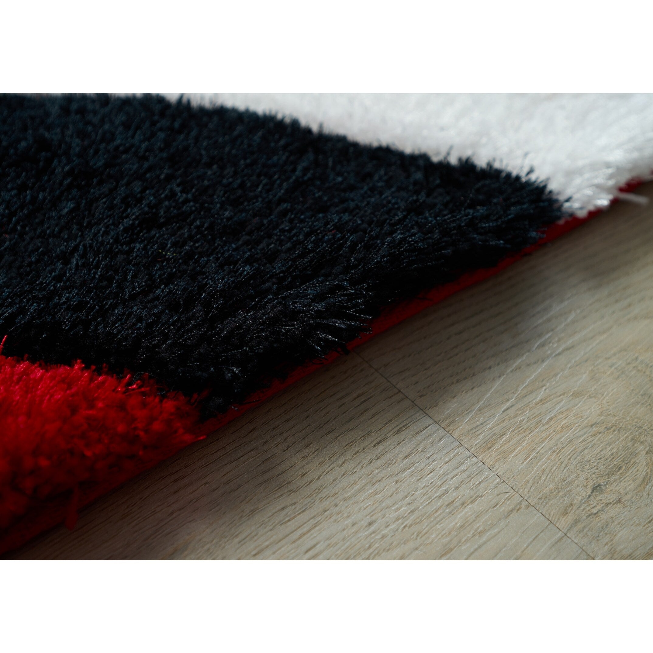 Tapis à poils longs Mateos au design abstrait
