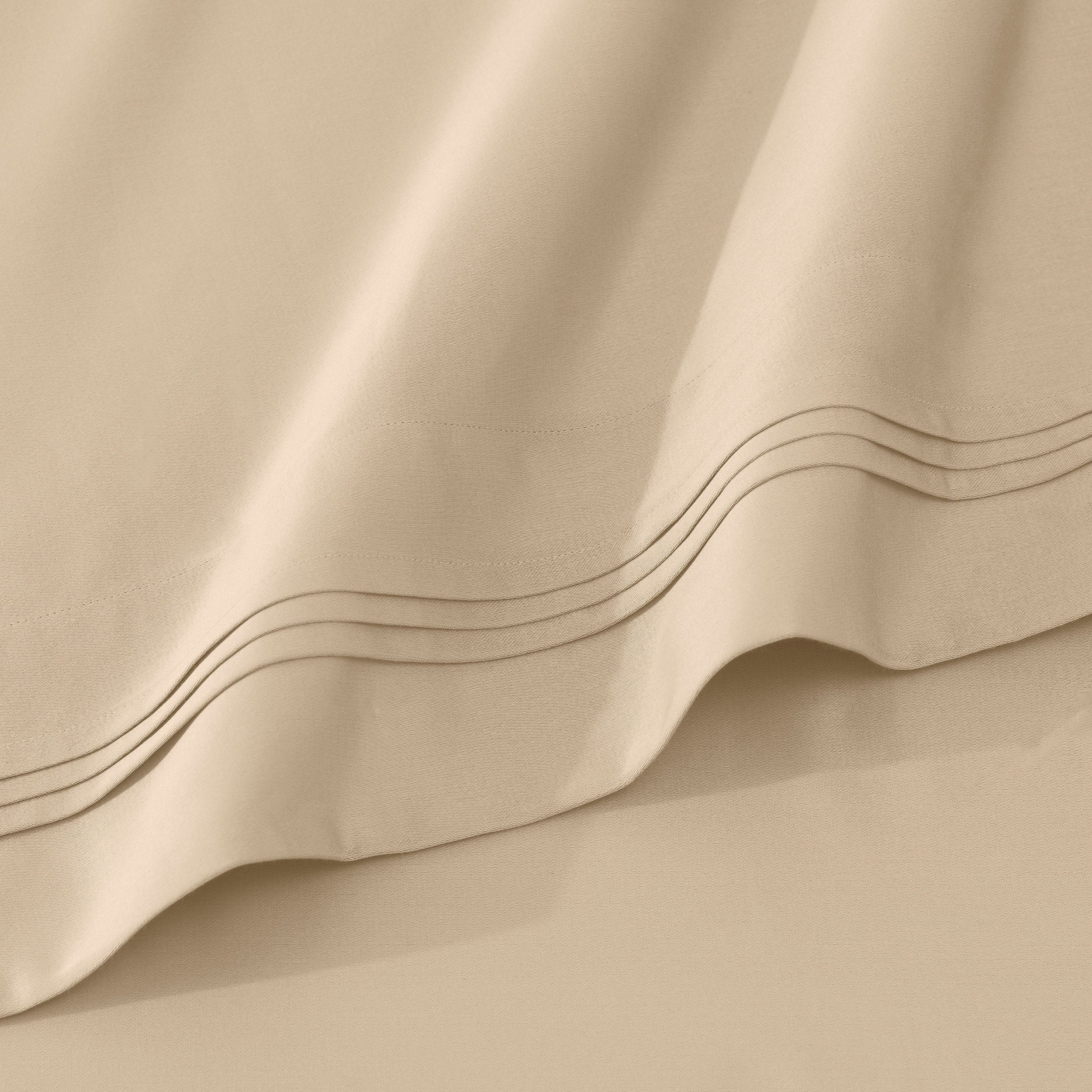 Parure de draps en coton égyptien de qualité supérieure 1000 fils au pouce carré, à poches profondes et à motif uni